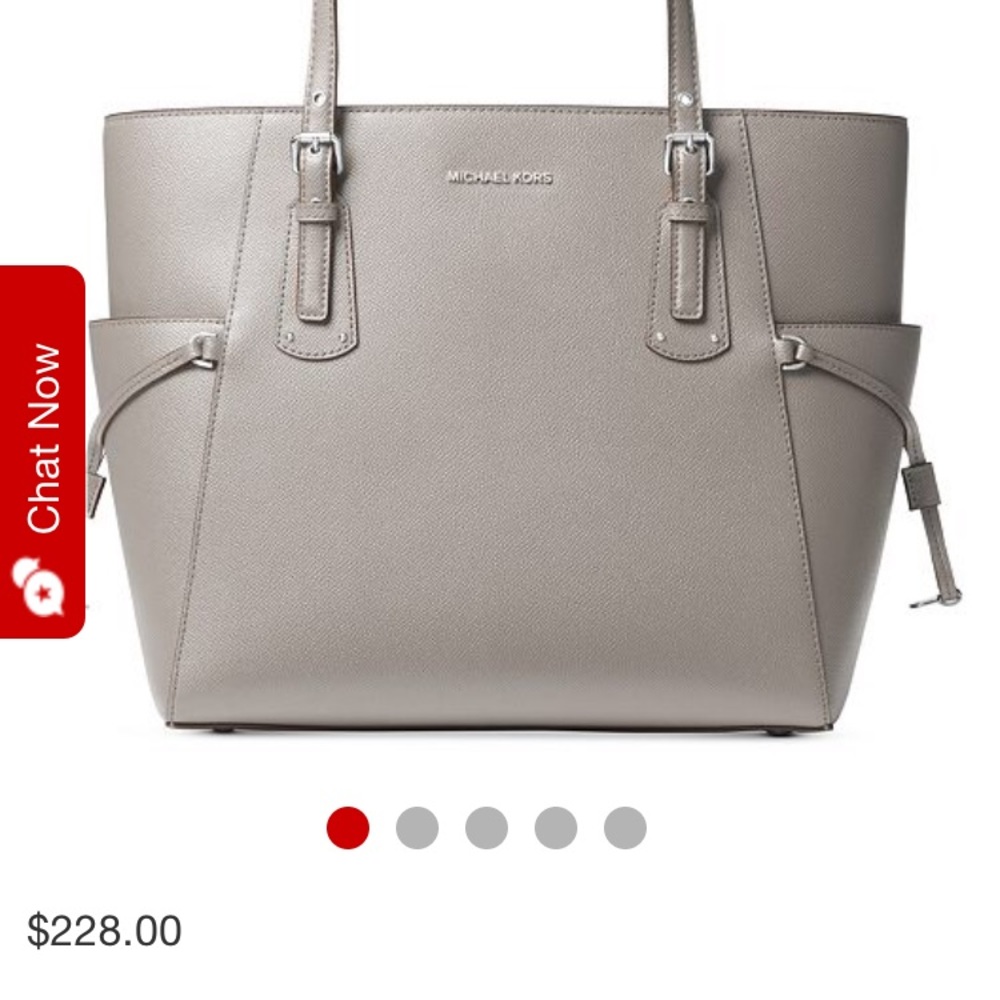 Michael Kors Voyager with silver pocket details